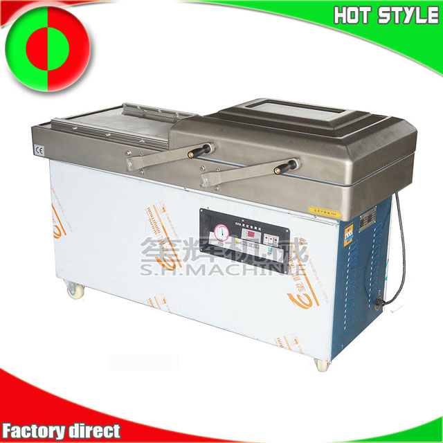 Vacuum food packing machine