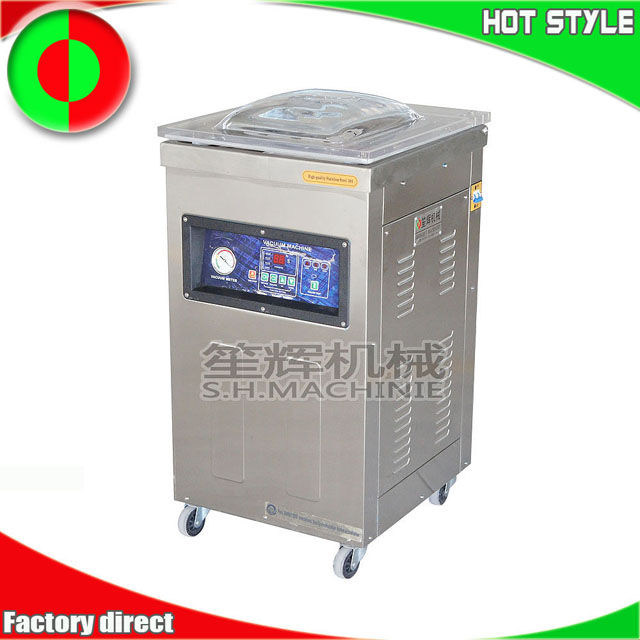 Vacuum food packing machine