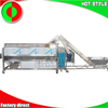 Large scale production line for peeling, cutting and cleaning vegetables and fruits